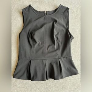 Black Peplum Top with Exposed Zipper Back - fits like a medium